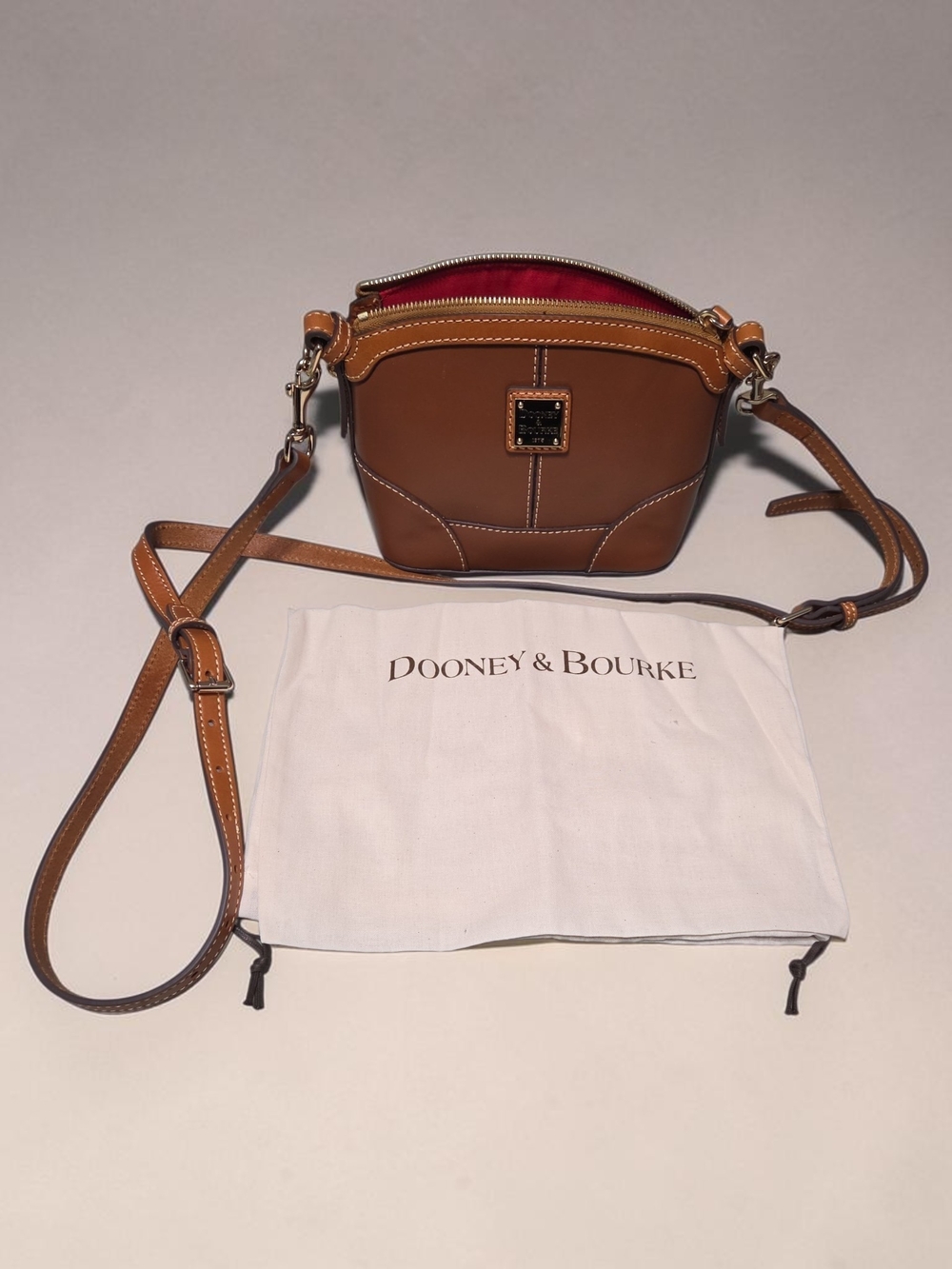 Dooney & Bourke Brown Leather Crossbody with Red Lining Mini
